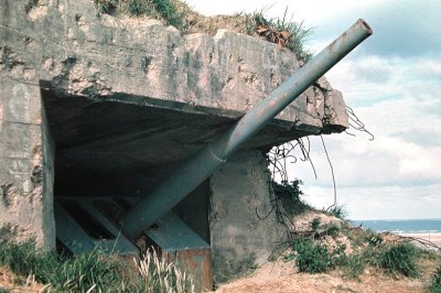 Okinawa  -- Gun bunkers on hill in front of transient barracks