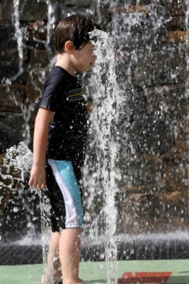 David in a water spout at Falls Park