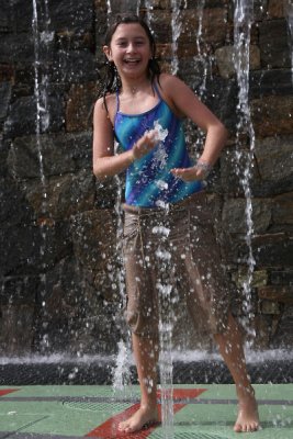 Jacklyn playing the spout like a drum