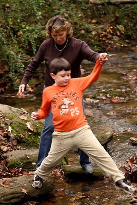 Aunt Lynne helps David cross the creek