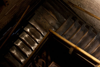 Inside Asinelli, close to the top, looking down and dripping sweat