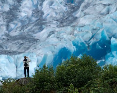 Visitor photographing Mendenhall Glacier