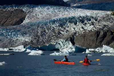 Kayakers on a spectacular day at Mendenhall Glacier