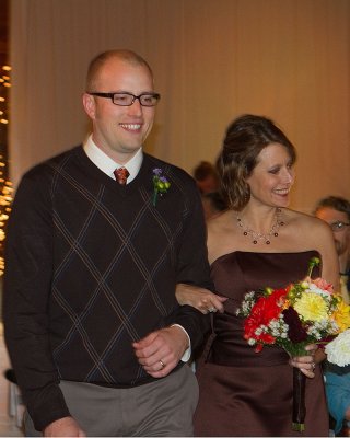 Rylan McGee and Pam Leary walking up the aisle