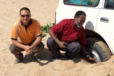 Dereje, Binod and myself stuck in sand