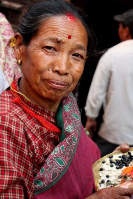What will she receive from the deity in Nepalese Year 2066?
