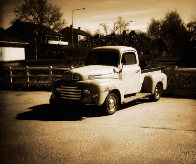 old yellow pickup truck / b&w