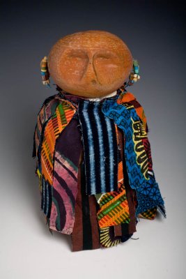 Egungum figure with African fabric