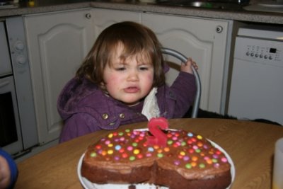 Aoibh Blows out Candles