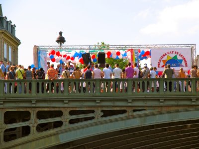 A Gay Parade crosses the Seine