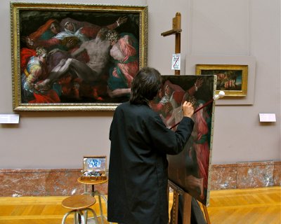 Practising his art at the Louvre