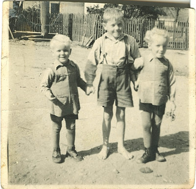 Manfred Bessel left Wolfgang Bessel right middle unknown