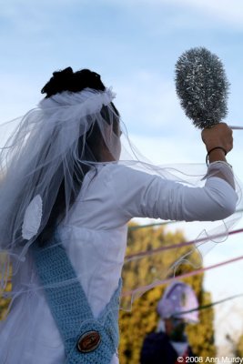 Malinche holding ribbon for maypole dance