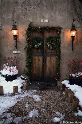 Holiday house with wreaths