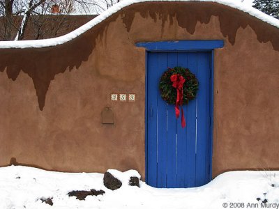 Blue door with wreath