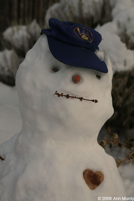 Snowman with baseball hat