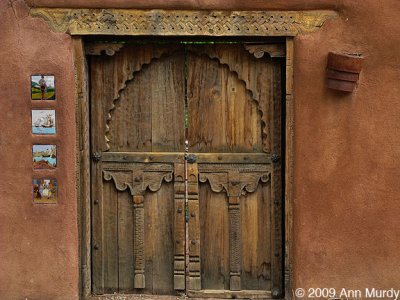 Wooden door with tiles