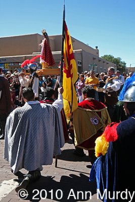 Praying to La Conquistadora