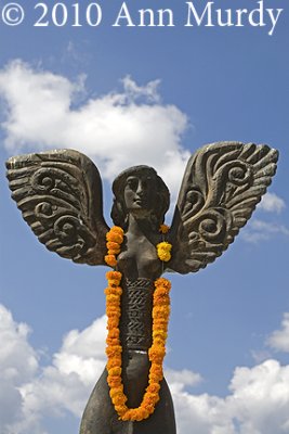 Angel with marigolds