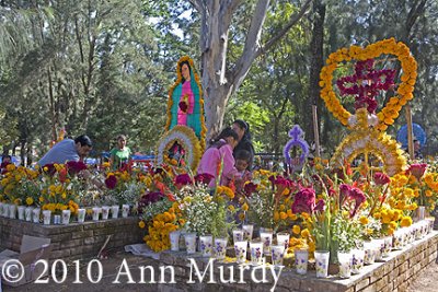 Families decorating graves