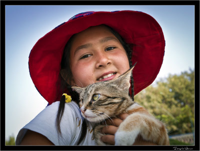 Lady with a hat and a cat
