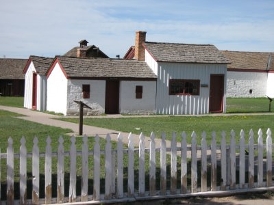 Milk House and School with the Traders Post behind them.