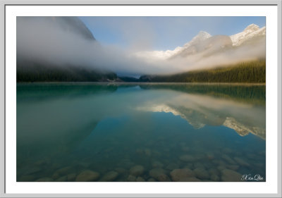 Morning fog lifting over Lake Louise