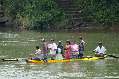 People crossing a river Sri Lanka