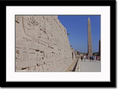 Wall of Hieroglyph and Obelisk in Background