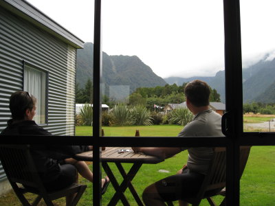 Relaxing and enjoying the view outside our room at Fox Glacier