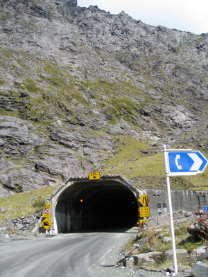 The famous one-lane Homer Tunnel, built thru the divide