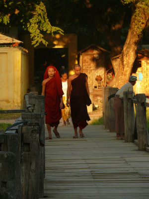 Two monks on bridge Mandalay.jpg