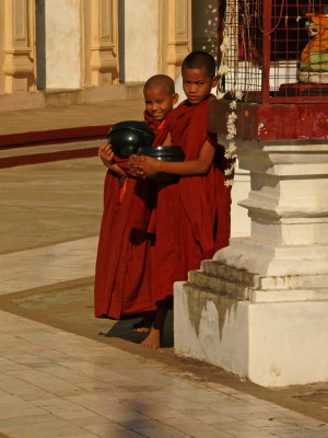 Two novices with alms bowls.jpg