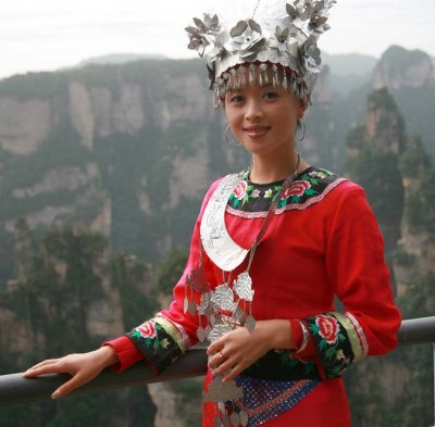 Local Ethnic TuJia Girl in traditional clothing