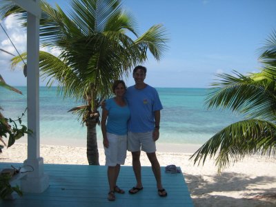 Rich and Galina pose at the conch shack-beach in background
