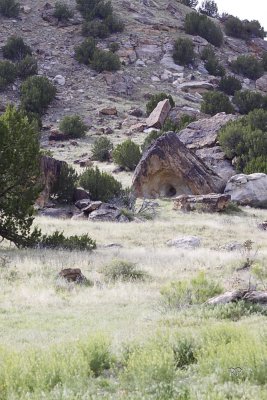 Distant view of house-like looking rock