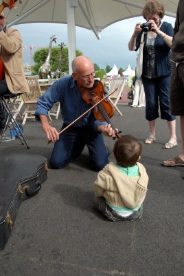 the band was playing . so Euan stopped to listen 