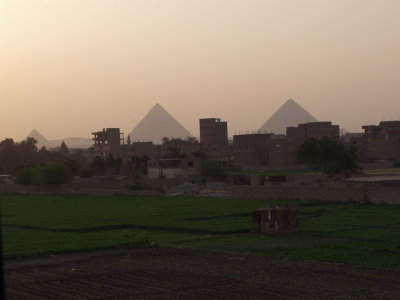 Pyramids thro the evening haze of Cairo.jpg