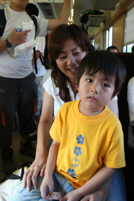 Mother & Son On The Train To Hagi (3)