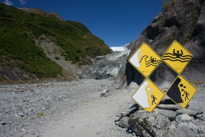 Warning signs at Franz Joseph Glacier
