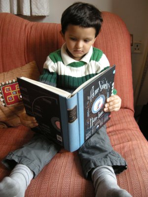 Rahil enjoying The ACME Novelty Date Book (1995-2002)