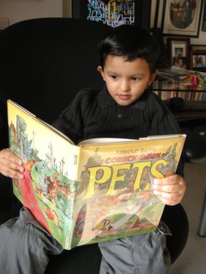 Rahil reading Arnold Roth's Comick Book of Pets