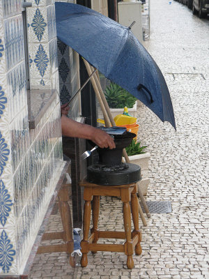 Preparing Sardines in the rain