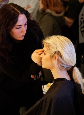 Preparing model at the Stockholm Photo Fair