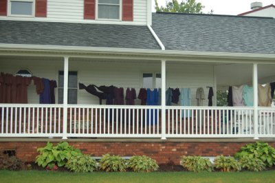 Amish clothes drying on the porch. Notice just solid colors.