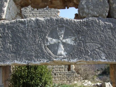 See the pie shape within the Maltese cross.  This is the first time I've seen these peacock reliefs