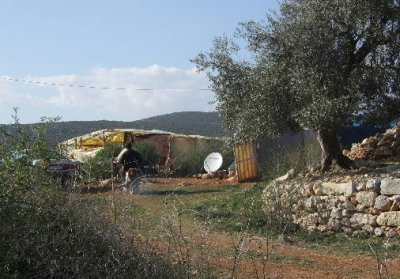 There were two houses here made of plastic sheeting--but of course they had a new satellite dish for watching TV.