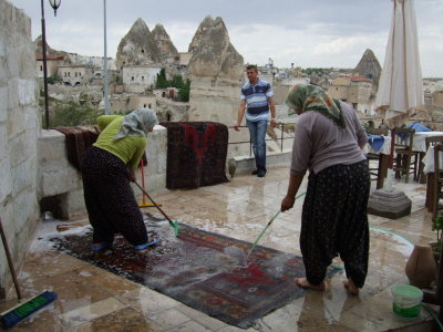 Goreme: Its carpet washing day at the cave hotel.