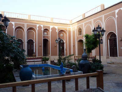 pool in the middle of the courtyard to cool down temperatures in hot summer