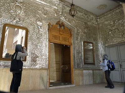 a mirrored, open-fronted audience hall